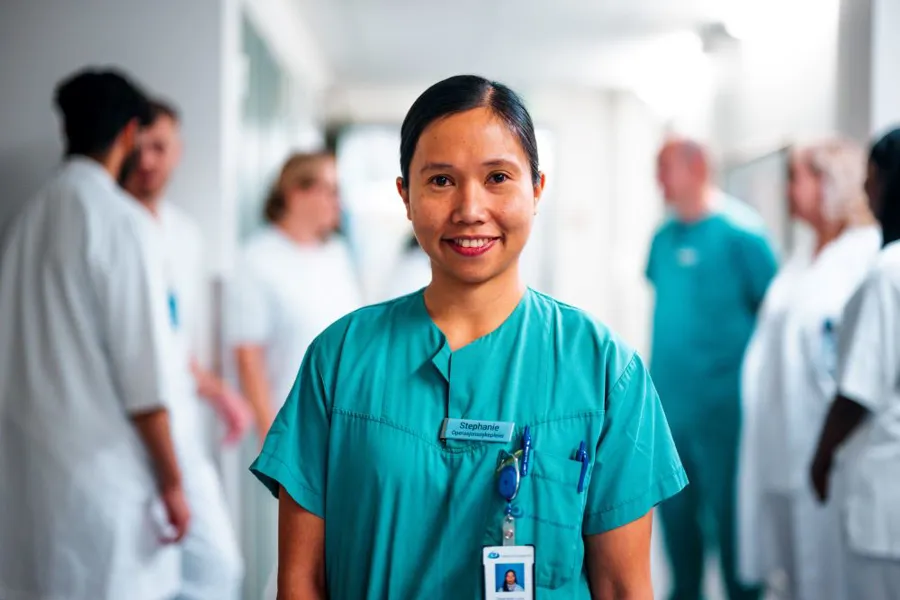 A person wearing a blue shirt