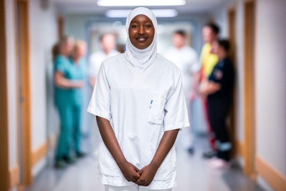 A man wearing a white shirt