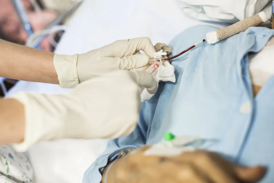 A person in a white lab coat