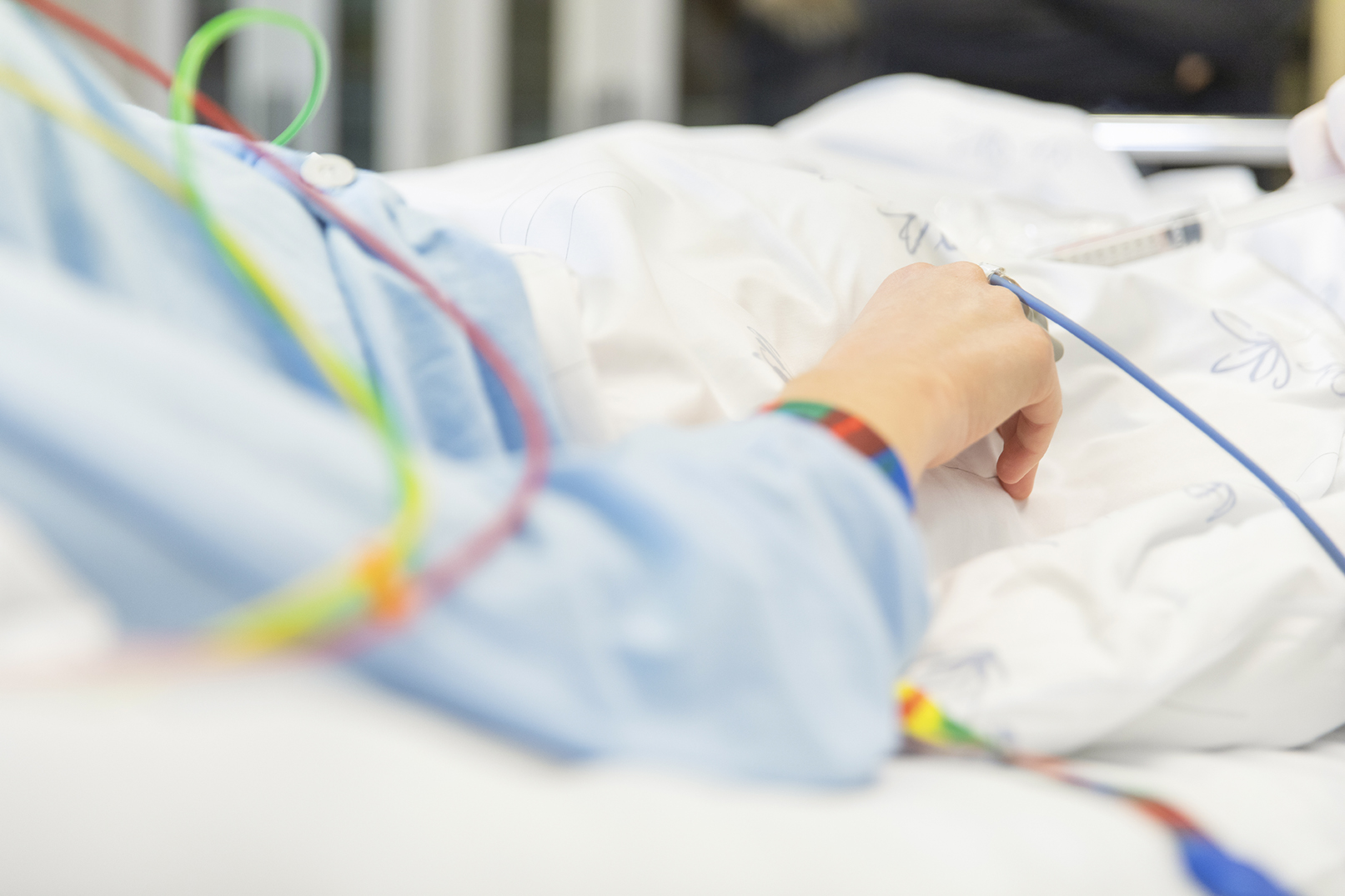 Pasient i sykehusseng, illustrasjonsbilde